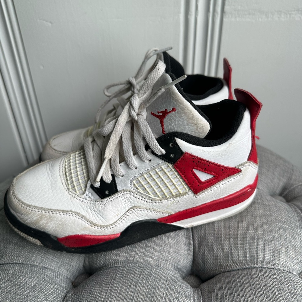 Nike Air Jordan 4 White and Red Sneakers